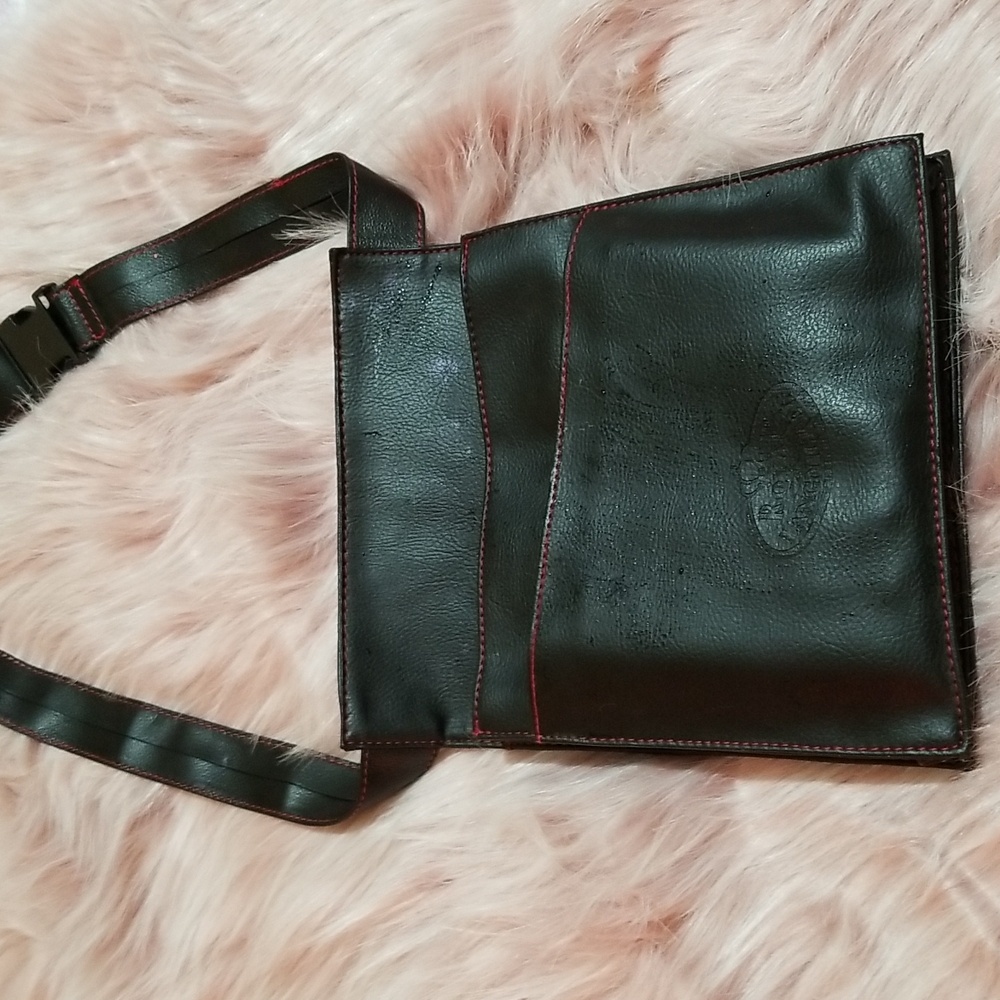 Makeup bag holder